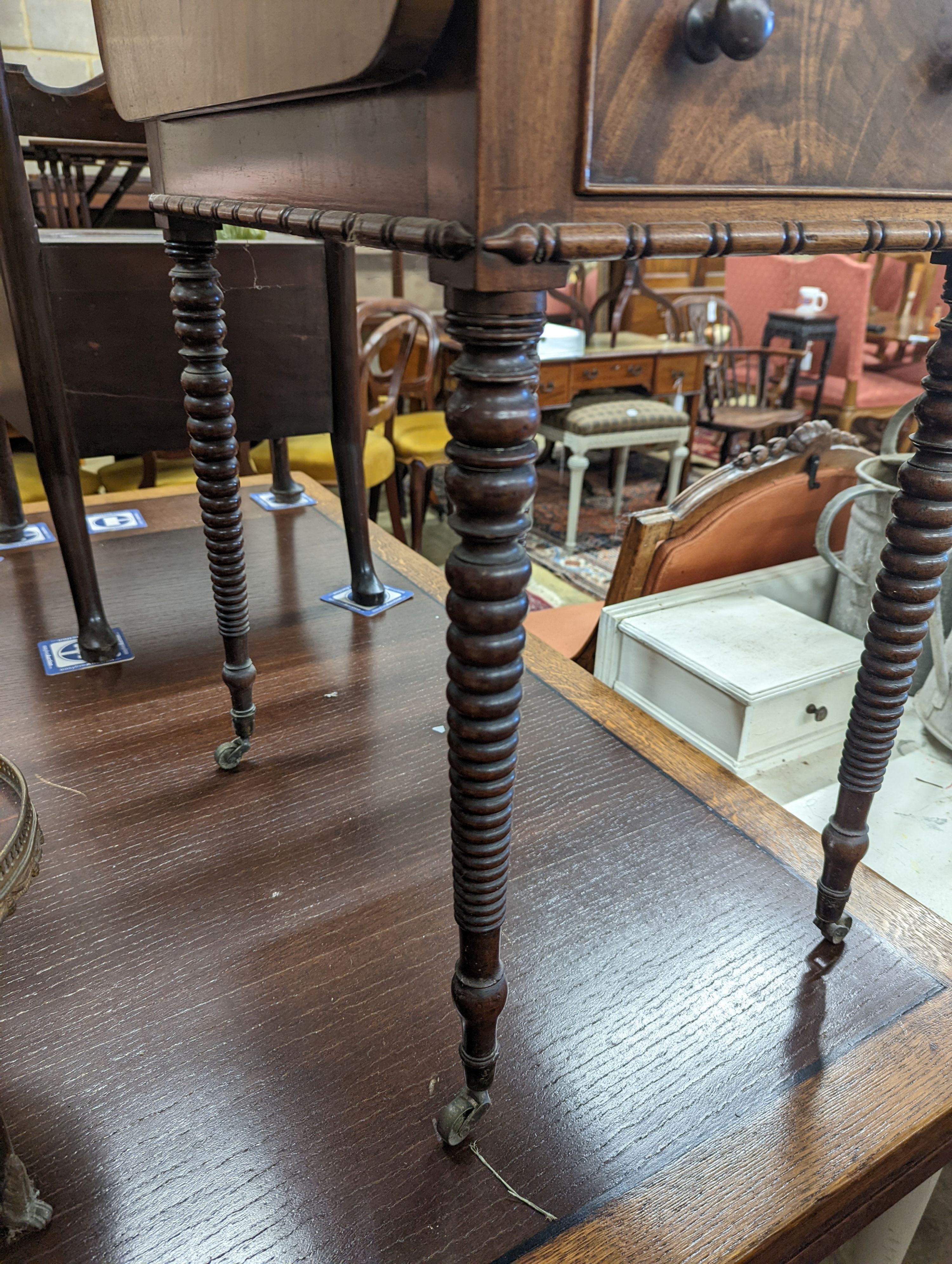 A Regency mahogany drop flap work table, width 38cm, depth 50cm, height 74cm